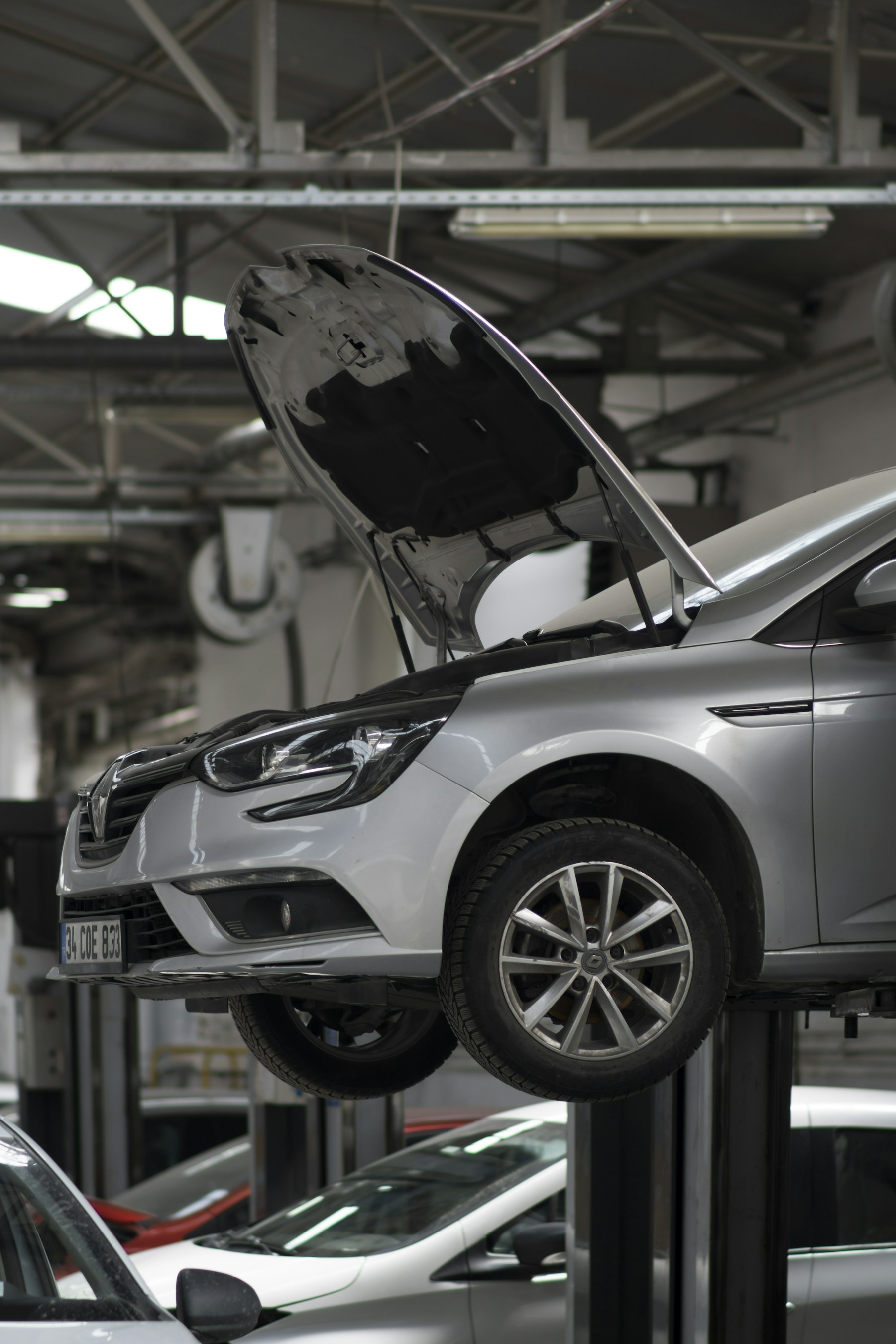 Cars being serviced in our automotive repair workshop